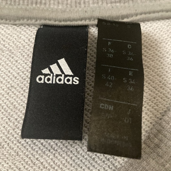 Adidas sweatshirt; “ADIDAS” across the back shoulders. - Picture 2 of 3